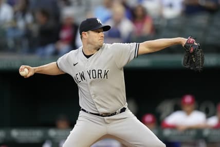 Apr 27, 2023; Arlington, Texas, USA; New York Yankees starting pitcher Gerrit Cole (45) delivers a pitch to the Texas Rangers during the first inning at Globe Life Field. Mandatory Credit: Jim Cowsert-USA TODAY Sports