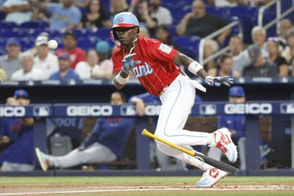 Apr 29, 2023; Miami, Florida, USA; Miami Marlins center fielder Jazz Chisholm Jr. (2) heads to first on his bunt single against the Chicago Cubs during the first inning at loanDepot Park. Mandatory Credit: Rhona Wise-USA TODAY Sports