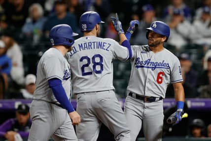 Jun 29, 2023; Denver, Colorado, USA; Los Angeles Dodgers designated hitter J.D. Martinez (28) celebrates his two run home run with left fielder David Peralta (6) and third baseman Max Muncy (13) in the fourth inning against the Colorado Rockies at Coors Field. Mandatory Credit: Isaiah J. Downing-USA TODAY Sports