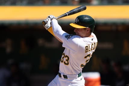 Jul 1, 2023; Oakland, California, USA;  Oakland Athletics left fielder JJ Bleday (33) hits a single during the eighth inning against the Chicago White Sox at Oakland-Alameda County Coliseum. Mandatory Credit: Stan Szeto-USA TODAY Sports