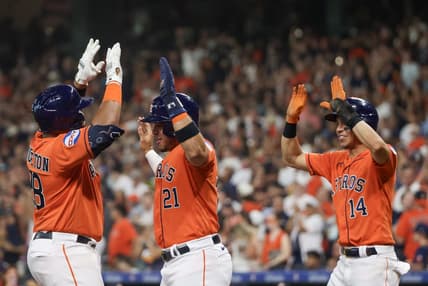 Aug 11, 2023; Houston, Texas, USA; Houston Astros first baseman Jon Singleton (28) celebrates his three run home run with designated hitter Yainer Diaz (21) and  center fielder Mauricio Dubon (14) in the second inning at Minute Maid Park. Mandatory Credit: Thomas Shea-USA TODAY Sports