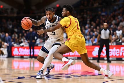 Nov 17, 2023; Villanova, Pennsylvania, USA; Villanova Wildcats guard Justin Moore (5) drives against Maryland Terrapins guard Jahari Long (2) in the first half at William B. Finneran Pavilion. Mandatory Credit: Kyle Ross-USA TODAY Sports
