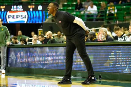 Nov 28, 2023; Waco, Texas, USA;  Nicholls State Colonels head coach Tevon Saddler calls a play against the Baylor Bears during the first half at Ferrell Center. Mandatory Credit: Chris Jones-USA TODAY Sports