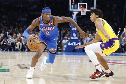 Nov 30, 2023; Oklahoma City, Oklahoma, USA; Oklahoma City Thunder guard Shai Gilgeous-Alexander (2) drives around Los Angeles Lakers guard Max Christie (10) during the second half at Paycom Center. Mandatory Credit: Alonzo Adams-USA TODAY Sports