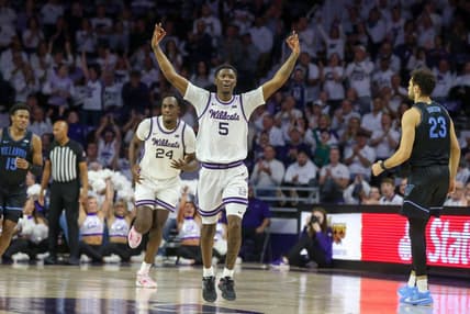 Dec 5, 2023; Manhattan, Kansas, USA; Kansas State Wildcats guard Cam Carter (5) celebrates a three-point basket during the second half against the Villanova Wildcats at Bramlage Coliseum. Mandatory Credit: Scott Sewell-USA TODAY Sports