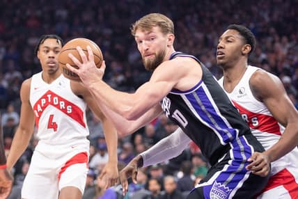 Jan 5, 2024; Sacramento, California, USA; Sacramento Kings forward Domantas Sabonis (10) controls the ball against the Toronto Raptors during the first quarter at Golden 1 Center. Mandatory Credit: Ed Szczepanski-USA TODAY Sports
