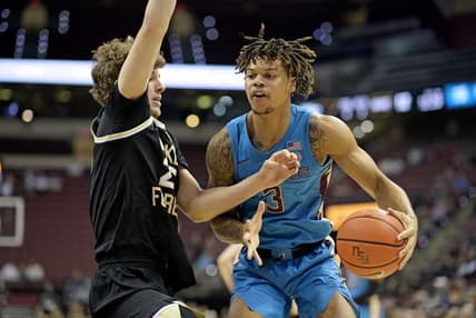 Jan 9, 2024; Tallahassee, Florida, USA; Wake Forest Demon Deacons forward Zach Keller (25) defends a drive by Florida State Seminoles guard Cam Corhen (3) during the first half at Donald L. Tucker Center. Mandatory Credit: Melina Myers-USA TODAY Sports