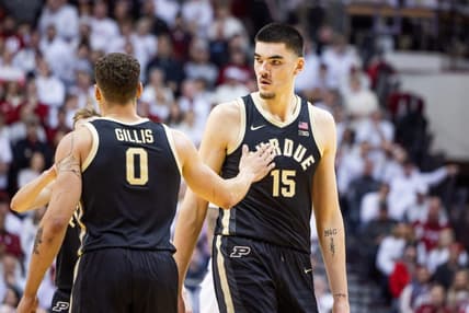 Jan 16, 2024; Bloomington, Indiana, USA; Purdue Boilermakers center Zach Edey (15) and forward Mason Gillis (0) celebrate a basket in the first half against the Indiana Hoosiers at Simon Skjodt Assembly Hall. Mandatory Credit: Trevor Ruszkowski-USA TODAY Sports