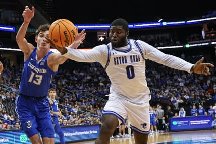 Jan 20, 2024; Newark, New Jersey, USA; Seton Hall Pirates guard Dylan Addae-Wusu (0) reaches for the ball against Creighton Bluejays forward Mason Miller (13) during the first half at Prudential Center. Mandatory Credit: Vincent Carchietta-USA TODAY Sports