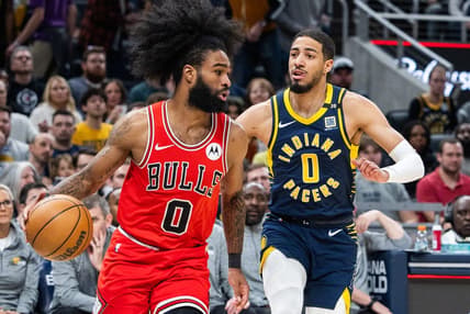 Mar 13, 2024; Indianapolis, Indiana, USA; Chicago Bulls guard Coby White (0) dribbles the ball while Indiana Pacers guard Tyrese Haliburton (0) defends in the first half at Gainbridge Fieldhouse. Mandatory Credit: Trevor Ruszkowski-USA TODAY Sports
