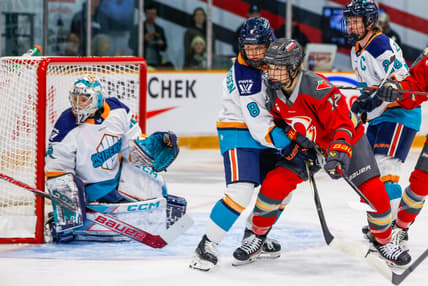 New York Sirens defenders Maja Nylen Persson and Micah Zandee-Hart protect the net against the Ottawa Charge.
