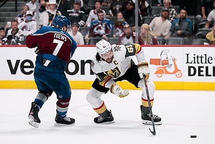 Jun 8, 2021; Denver, Colorado, USA; Vegas Golden Knights right wing Mark Stone (61) makes a play past Colorado Avalanche defenseman Devon Toews (7) in the third period in game five of the second round of the 2021 Stanley Cup Playoffs at Ball Arena. Mandatory Credit: Isaiah J. Downing-USA TODAY Sports