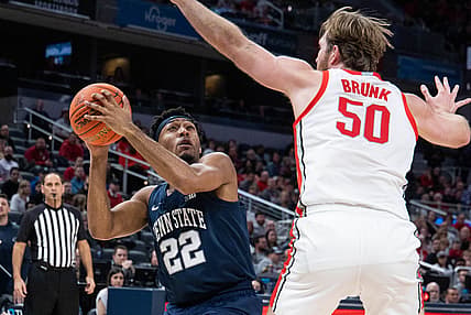 Mar 10, 2022; Indianapolis, IN, USA; Penn State Nittany Lions guard Jalen Pickett (22) looks to shoot the ball while Ohio State Buckeyes center Joey Brunk (50) defends  in the second half at Gainbridge Fieldhouse. Mandatory Credit: Trevor Ruszkowski-USA TODAY Sports