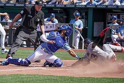 Jul 9, 2022; Kansas City, Missouri, USA; Kansas City Royals catcher MJ Melendez (1) gets the out on Cleveland Guardians right fielder Nolan Jones (33) at home plate in the third inning at Kauffman Stadium. Mandatory Credit: Denny Medley-USA TODAY Sports