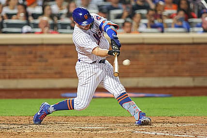 Jul 24, 2022; New York City, New York, USA; New York Mets first baseman Pete Alonso (20) hits a three run home run during the sixth inning against the San Diego Padres at Citi Field. Mandatory Credit: Vincent Carchietta-USA TODAY Sports