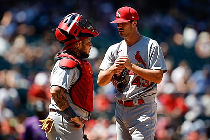 Aug 11, 2022; Denver, Colorado, USA; St. Louis Cardinals starting pitcher Dakota Hudson (43) talks with catcher Yadier Molina (4) in the second inning against the Colorado Rockies at Coors Field. Mandatory Credit: Isaiah J. Downing-USA TODAY Sports