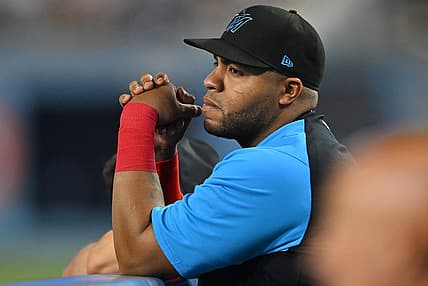 Aug 20, 2022; Los Angeles, California, USA;  Miami Marlins first baseman Jesus Aguilar (99) looks on from the dugout during the game against the Los Angeles Dodgers at Dodger Stadium. Mandatory Credit: Jayne Kamin-Oncea-USA TODAY Sports