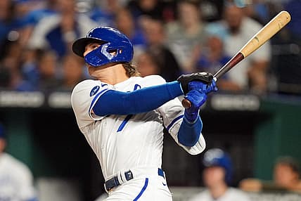 Aug 23, 2022; Kansas City, Missouri, USA; Kansas City Royals shortstop Bobby Witt Jr. (7) hits a home run against the Arizona Diamondbacks during the fourth inning at Kauffman Stadium. Mandatory Credit: Jay Biggerstaff-USA TODAY Sports