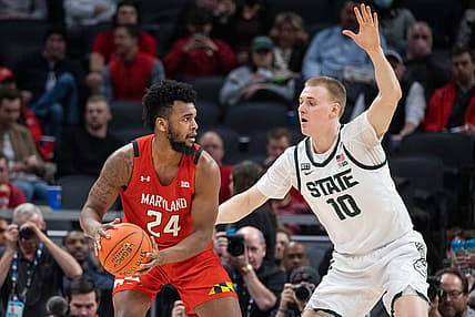 Mar 10, 2022; Indianapolis, IN, USA; Maryland Terrapins forward Donta Scott (24) controls the ball the ball while Michigan State Spartans forward Joey Hauser (10) defends in the second half at Gainbridge Fieldhouse. Mandatory Credit: Trevor Ruszkowski-USA TODAY Sports