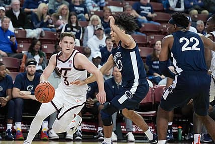 Nov 18, 2022; Charleston, South Carolina, USA; Virginia Tech Hokies guard Sean Pedulla (3) gets around Penn State Nittany Lions guard Dallion Johnson (23) in the first half at TD Arena. Mandatory Credit: David Yeazell-USA TODAY Sports