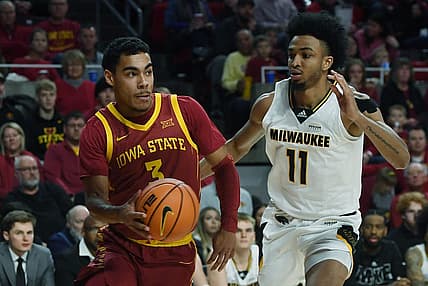 Iowa State University Cyclones guard Tamin Lipsey (3) looks for pass the ball around Milwaukee Panthers guard/forward Vin Baker Jr. (11) during the first half at Hilton Coliseum Sunday, Nov. 20, 2022, in Ames, Iowa.  Photo by Nirmalendu Majumdar/Ames Tribune

Ncaa Men S Basketball