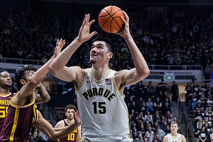 Dec 4, 2022; West Lafayette, Indiana, USA; Purdue Boilermakers center Zach Edey (15) shoots the ball while Minnesota Golden Gophers forward Dawson Garcia (3) defends in the second half at Mackey Arena. Mandatory Credit: Trevor Ruszkowski-USA TODAY Sports