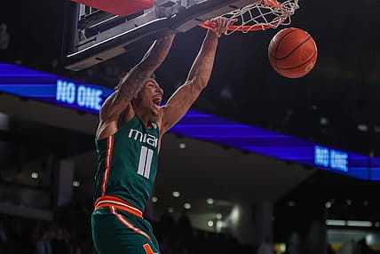 Jan 4, 2023; Atlanta, Georgia, USA; Miami Hurricanes guard Jordan Miller (11) dunks against the Georgia Tech Yellow Jackets in the first half at McCamish Pavilion. Mandatory Credit: Brett Davis-USA TODAY Sports
