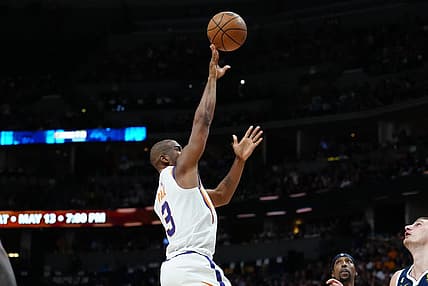 May 1, 2023; Denver, Colorado, USA; Phoenix Suns guard Chris Paul (3) shoots the ball in the first half against the Denver Nuggets during game two of the 2023 NBA playoffs at Ball Arena. Mandatory Credit: Ron Chenoy-USA TODAY Sports