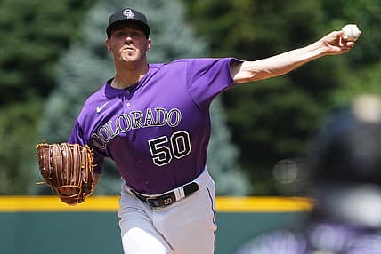 Jul 30, 2023; Denver, Colorado, USA; Colorado Rockies starting pitcher Ty Blach (50) pitches in the first inning against the Oakland Athletics at Coors Field. Mandatory Credit: Ron Chenoy-USA TODAY Sports