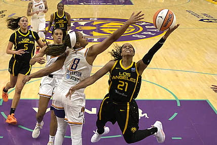 May 19, 2023; Los Angeles, California, USA; Phoenix Mercury guard Moriah Jefferson (8) blocks a shot by Los Angeles Sparks guard Jordin Canada (21) in the first half at Crypto.com Arena. Mandatory Credit: Jayne Kamin-Oncea-USA TODAY Sports