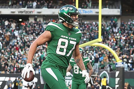 New York Jets tight end C.J. Uzomah (87) celebrates his touchdown reception against the Detroit Lions during the second half at MetLife Stadium. Mandatory Credit: Vincent Carchietta-USA TODAY Sports