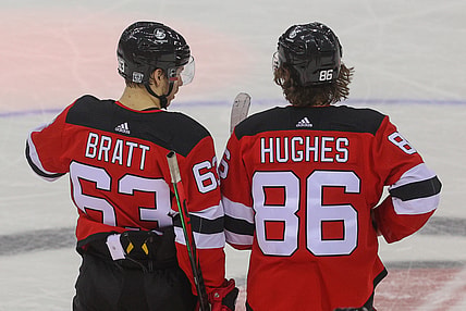 Jan 28, 2021; Newark, New Jersey, USA; New Jersey Devils left wing Jesper Bratt (63) and New Jersey Devils center Jack Hughes (86) talk during the third period of their game against the Philadelphia Flyers at Prudential Center. Mandatory Credit: Ed Mulholland-USA TODAY Sports