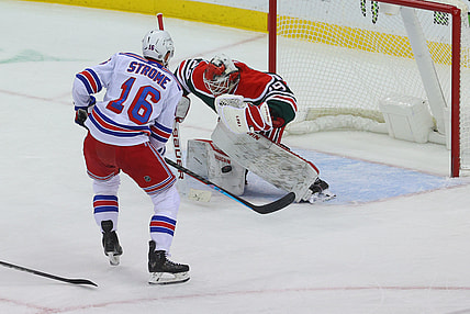 Mar 6, 2021; Newark, New Jersey, USA; New Jersey Devils goaltender Mackenzie Blackwood (29) makes a save on New York Rangers center Ryan Strome (16) during the first period at Prudential Center. Mandatory Credit: Ed Mulholland-USA TODAY Sports