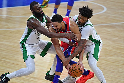 Jan 22, 2021; Philadelphia, Pennsylvania, USA; Philadelphia 76ers guard Ben Simmons (25) is trapped by Boston Celtics guard Jaylen Brown (7) and guard Marcus Smart (36) at Wells Fargo Center. Mandatory Credit: Eric Hartline-USA TODAY Sports
