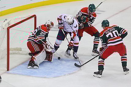 Apr 2, 2021; Newark, New Jersey, USA; New Jersey Devils goaltender Mackenzie Blackwood (29) makes a save on Washington Capitals center Evgeny Kuznetsov (92) during the second period at Prudential Center. Mandatory Credit: Ed Mulholland-USA TODAY Sports