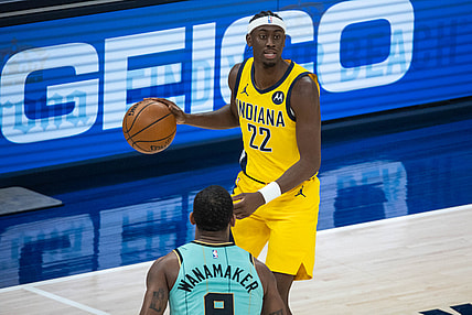 Apr 2, 2021; Indianapolis, Indiana, USA; Indiana Pacers guard Caris LeVert (22) dribbles the ball while Charlotte Hornets guard Brad Wanamaker (9) defends  in the second quarter at Bankers Life Fieldhouse. Mandatory Credit: Trevor Ruszkowski-USA TODAY Sports