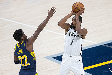 Apr 29, 2021; Indianapolis, Indiana, USA; Brooklyn Nets forward Kevin Durant (7) shoots the ball while Indiana Pacers guard Caris LeVert (22) defends in the third quarter at Bankers Life Fieldhouse. Mandatory Credit: Trevor Ruszkowski-USA TODAY Sports