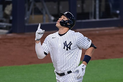 Apr 30, 2021; Bronx, New York, USA; New York Yankees right fielder Aaron Judge (99) celebrates after hitting a home run during the third inning against the Detroit Tigers at Yankee Stadium. Mandatory Credit: Vincent Carchietta-USA TODAY Sports