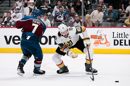 Jun 8, 2021; Denver, Colorado, USA; Vegas Golden Knights right wing Mark Stone (61) makes a play past Colorado Avalanche defenseman Devon Toews (7) in the third period in game five of the second round of the 2021 Stanley Cup Playoffs at Ball Arena. Mandatory Credit: Isaiah J. Downing-USA TODAY Sports