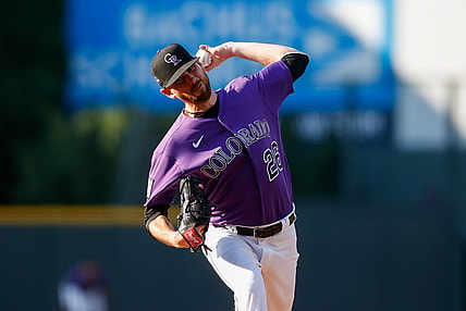Jun 14, 2021; Denver, Colorado, USA; Colorado Rockies starting pitcher Austin Gomber (26) pitches in the first inning against the San Diego Padres at Coors Field. Mandatory Credit: Isaiah J. Downing-USA TODAY Sports