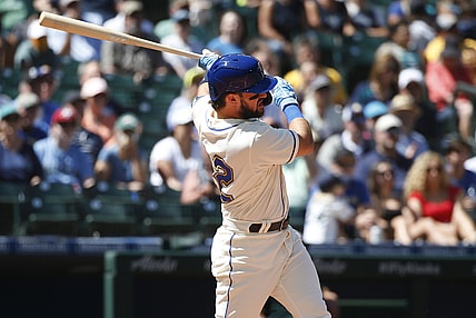 Jul 25, 2021; Seattle, Washington, USA; Seattle Mariners designated hitter Luis Torrens (22) hits an RBI single against the Oakland Athletics during the third inning at T-Mobile Park. Mandatory Credit: Joe Nicholson-USA TODAY Sports