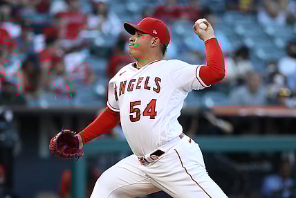 Sep 4, 2021; Anaheim, California, USA; Los Angeles Angels starting pitcher Jose Suarez (54) throws against the Texas Rangers during the first inning at Angel Stadium. Mandatory Credit: Kiyoshi Mio-USA TODAY Sports