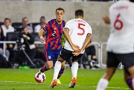 Oct 13, 2021; Columbus, Ohio, USA; the United States defender Sergino Dest (2) dribbles the ball while Costa Rica midfielder Celso Borges (5) defends  during a FIFA World Cup Qualifier soccer match at Lower.com Field. Mandatory Credit: Trevor Ruszkowski-USA TODAY Sports