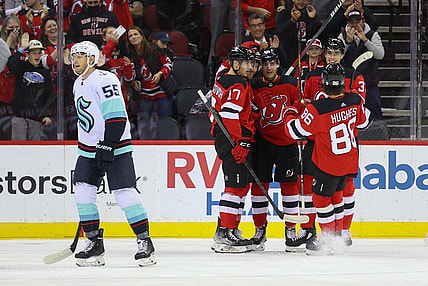 Oct 19, 2021; Newark, New Jersey, USA; The New Jersey Devils celebrate a goal by defenseman Damon Severson (28) during the first period of their game against the Seattle Kraken at Prudential Center. Mandatory Credit: Ed Mulholland-USA TODAY Sports
