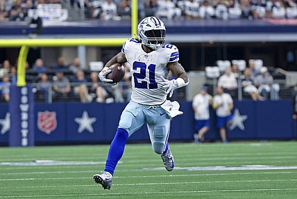 Oct 23, 2022; Arlington, Texas, USA;  Dallas Cowboys running back Ezekiel Elliott (21) runs with the ball during the first half against the Detroit Lions at AT&T Stadium. Mandatory Credit: Kevin Jairaj-USA TODAY Sports