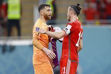 Nov 21, 2022; Al Rayyan, Qatar; United States of America goalkeeper Matt Turner (1) talks with Wales forward Gareth Bale (11) after a group stage match during the 2022 FIFA World Cup at Ahmed Bin Ali Stadium. Mandatory Credit: Yukihito Taguchi-USA TODAY Sports