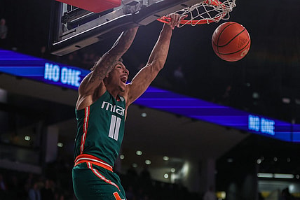 Jan 4, 2023; Atlanta, Georgia, USA; Miami Hurricanes guard Jordan Miller (11) dunks against the Georgia Tech Yellow Jackets in the first half at McCamish Pavilion. Mandatory Credit: Brett Davis-USA TODAY Sports