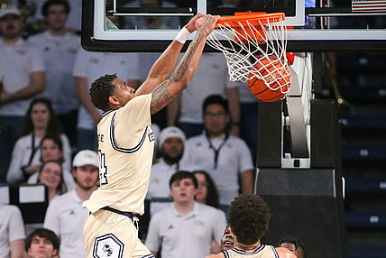 Jan 17, 2023; Atlanta, Georgia, USA; Georgia Tech Yellow Jackets forward Jalon Moore (14) dunks against the North Carolina State Wolfpack in the first half at McCamish Pavilion. Mandatory Credit: Brett Davis-USA TODAY Sports