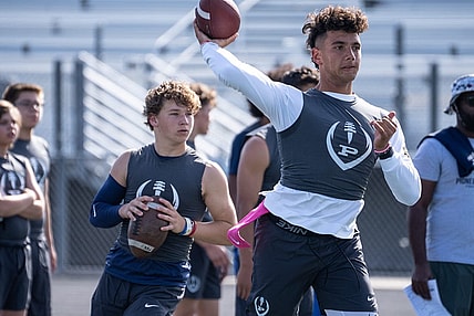 Pinnacle High School quarterbacks Wyatt Horton (left) and Dylan Raiola (right) attend a football practice on campus in Phoenix on May 2, 2023.

High School Football Pinnacle Spring Football 70170007007
