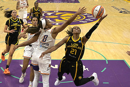 May 19, 2023; Los Angeles, California, USA; Phoenix Mercury guard Moriah Jefferson (8) blocks a shot by Los Angeles Sparks guard Jordin Canada (21) in the first half at Crypto.com Arena. Mandatory Credit: Jayne Kamin-Oncea-USA TODAY Sports
